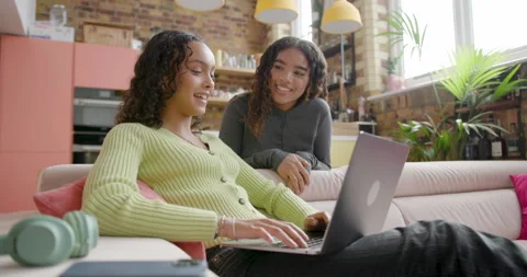 Female Students using artificial intelligence for their College School work at Stock Footage 297266925