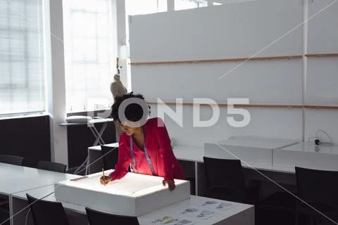 Female students working on a project at a fashion college Stock Photos