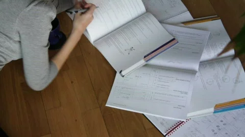 Female studying on floor Stock Footage 769295