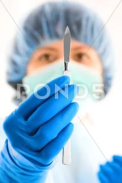 Female surgeon with scalpel Stock Photos