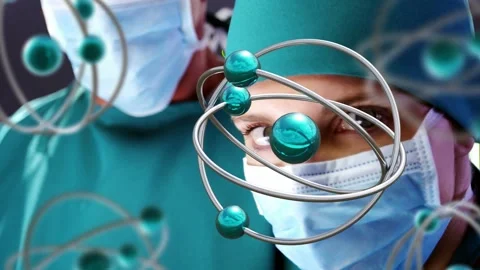 Female surgeon tracking atom models orbiting face after camera zoom, studying Stock Footage 335652070