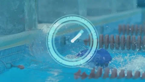 Female swimmer approaching pool wall, gripping edge and breathing while timer Stock Footage 330444281