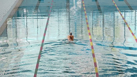 Female swimmer performing the breaststro... | Stock Video | Pond5