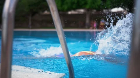 Female swimmer training in pool as part of road to Olympic-level competitio.. Stock Footage 343875338