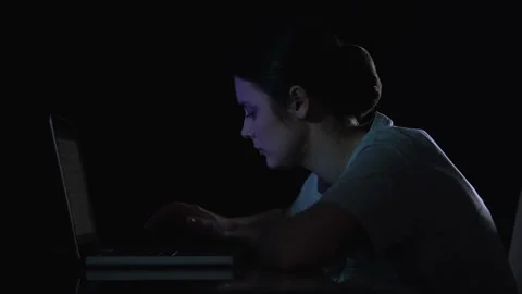 Female system administrator trying to fix errors on laptop, failure, viruses Stock Footage 111903665