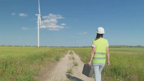 Female system engineer in helmet with suitcase Stock Footage 301421191