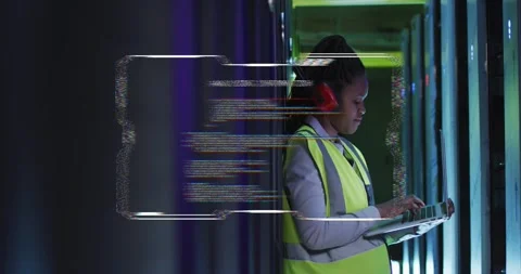 Female systems engineer tapping tablet in server aisle, bringing HUD online and Stock Footage 334179129