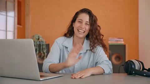 Female talking to camera sitting at her Stock Video Pond5