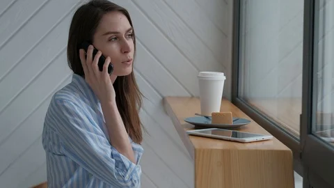 Female talking on a mobile phone Video stock 87732753
