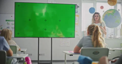 Female Teacher Educating Elementary School Students. Green Screen Template on 스톡 동영상 315538983