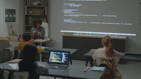 Female Teacher of Programming Having Discussion with Students 스톡 동영상 244700773