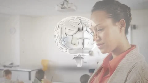 Female teacher tapping tablet classroom, bringing 3D brain overlay aligning with Stock Footage 331214506
