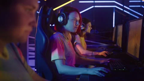 A female Team of is playing the CS:GO Co... | Stock Video | Pond5