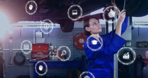 Female tech inspecting wheel, adjusting fastener for auto repair while animated Stock Footage 333904871