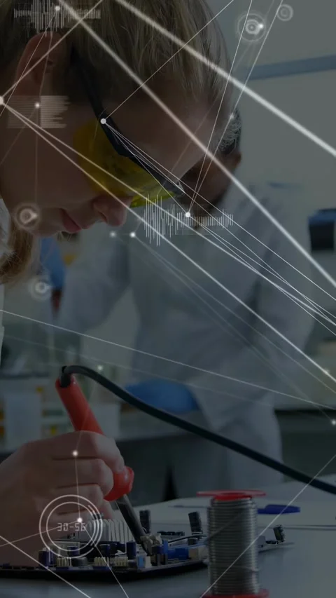 Female tech placing PCB, steadying iron and applying solder for electronics test Stock Footage 332598413