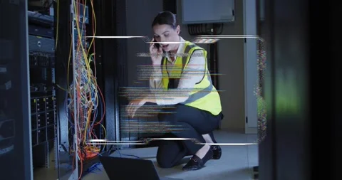 Female tech receiving phone call and adjusting cables to restore network, HUD Stock Footage 334179130