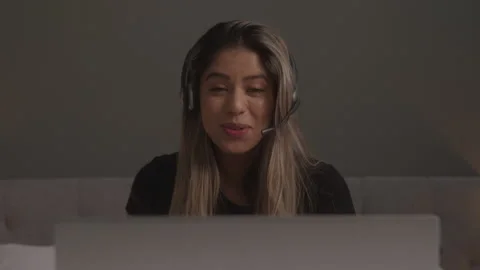 Female Tech Support in a Virtual Meeting Stock Footage 208784532