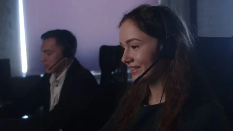 Female Technical Support Specialist Working On Computer In Call Center. Stock Footage 194410308