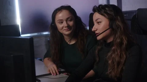 Female Technical Support Team Working Together In Office, Helping Clients. Stock Footage 194409946