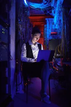 Female Technician Setting Computer Network Stock Photos