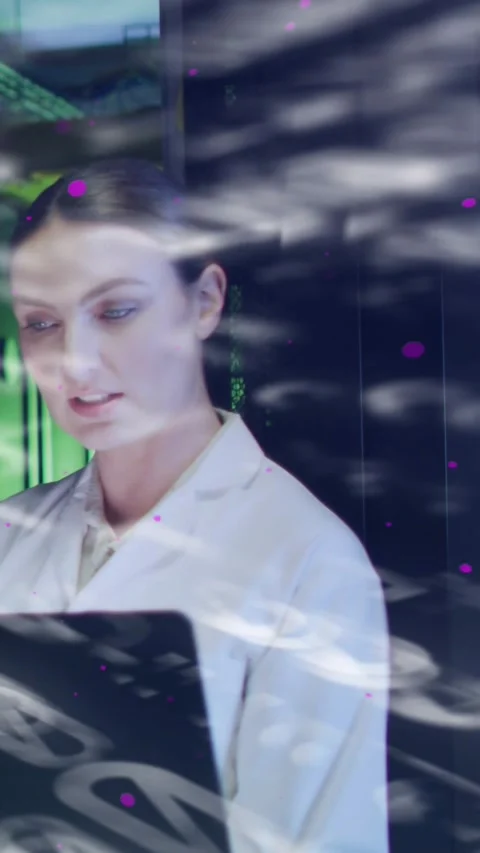 Female technician tapping tablet, animated overlay scrolling across face, Stock Footage 331270778