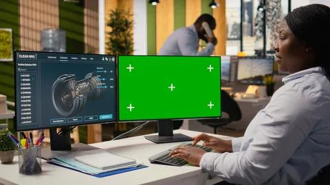 Female technician using CAD tool for wind turbines on isolated screen computer Stock Photos