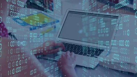 Female teen placing hands on keyboard typing while binary overlay flowing across Stock Footage 335651753