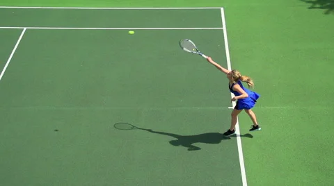 Female tennis player serves. Stock Footage