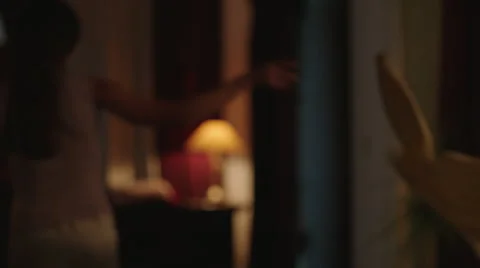 Female throws her jacket in the bedroom Video stock 45018193