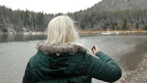 Female Throws Stone Slow Motion Stock-Footage 101033170