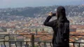 Female tourist photographing beautiful cityscape on cellphone, traveling HD Footage