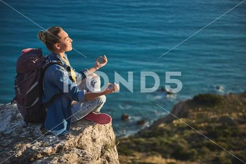 Female tourist plunging into nirvana on nature Stock Photos