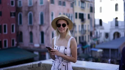 Female tourist using phone Stock Footage 100201731