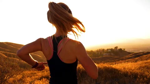 Female Trail Runner Slow Motion at Sunset Stock Footage 159515747