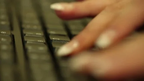 Female typing on a computer keyboard Stock Footage 73286563