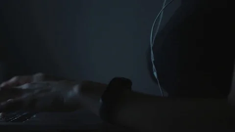Female typing on laptop in evening Stock-Footage 70790583