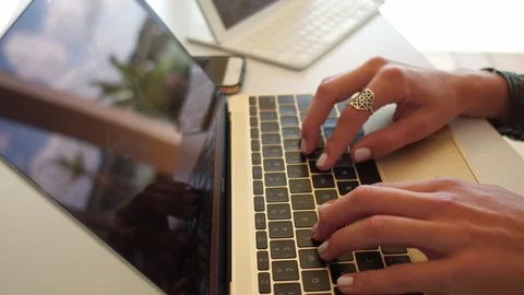Female typing on laptop Stock Footage 88466347