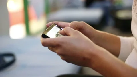 Female typing on a phone Stock Footage 51070911