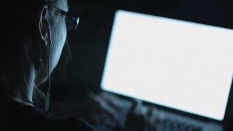 Female typing sitting by table in evening 動画素材 70790842