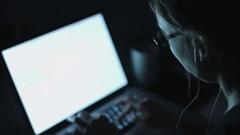 Female typing sitting by table in evening Stock Footage 70790888