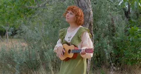 Female with ukulele Stock Footage 139355576