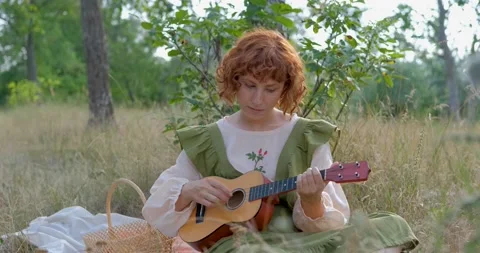 Female with ukulele Stock Footage 139355769