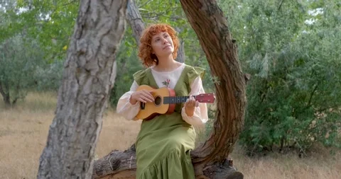 Female with ukulele Stock Footage 139355798