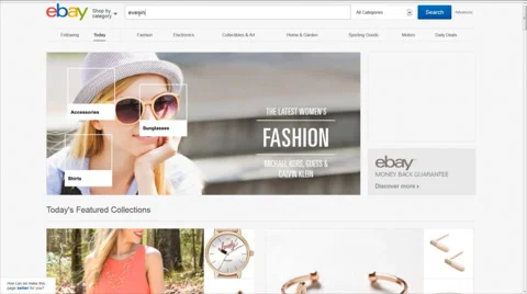 Female user browse eBay website looking for dress Stock Footage 62434496
