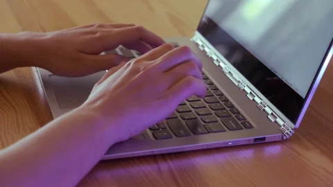 Female user hands typing on notebook keyboard. Close up side view Stock Footage 140204976