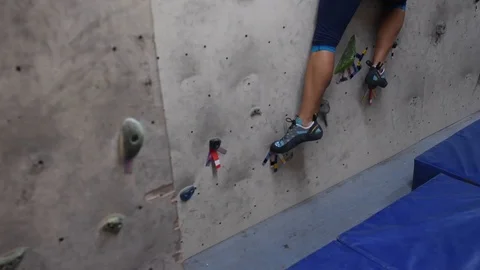 Female using climbing wall for workout Video stock 111811642