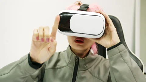 Female Using Gestures with Hands VR goggles headset modern technology Stock Footage 166436390