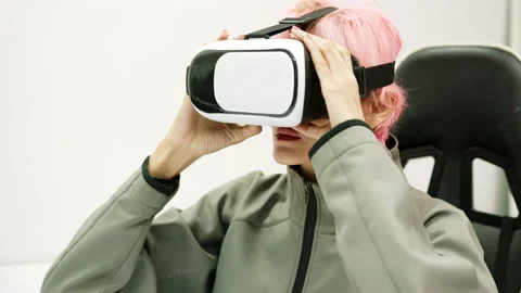 Female Using Gestures with Hands VR goggles headset modern technology Stock Footage 166437569