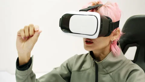 Female Using Gestures with Hands VR goggles headset modern technology Stock Footage 166439059