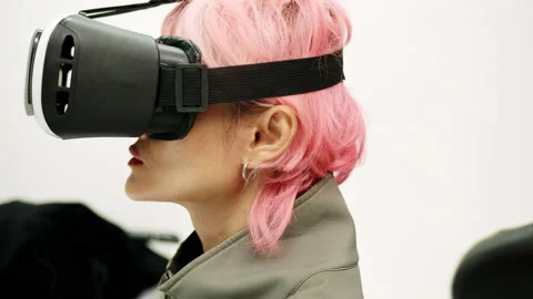 Female Using Gestures with Hands VR goggles headset modern technology Stock Footage 166439500